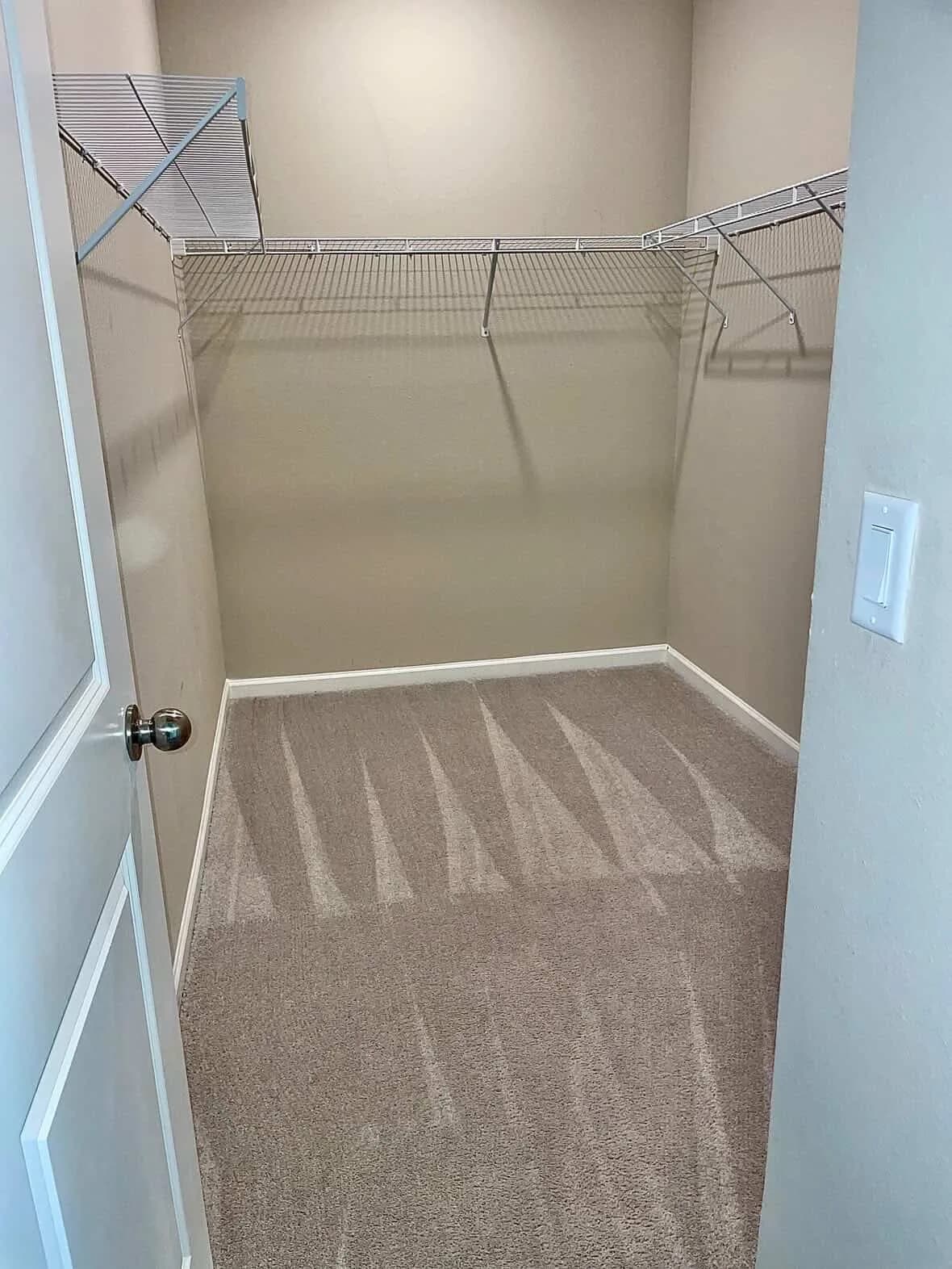 Walk-in closet after move-out cleaning by Pristine Cleaning Gurus