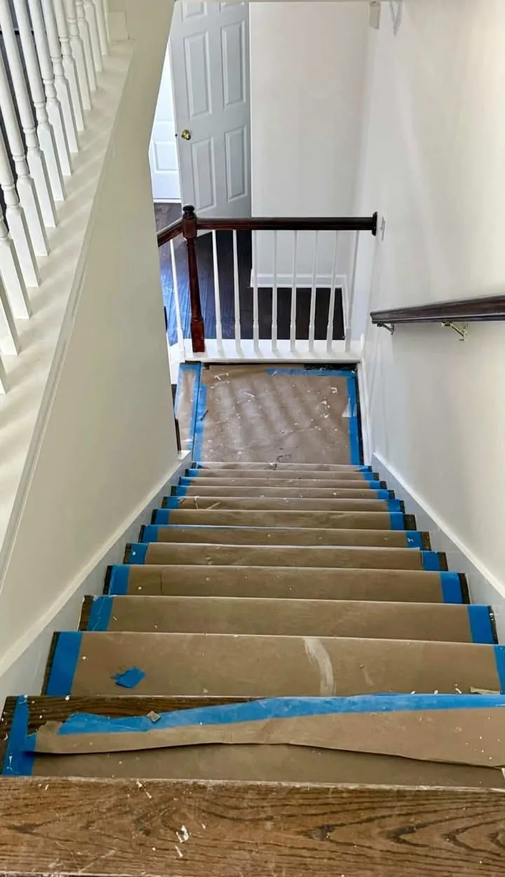 Staircase before post-construction cleanup in Jacksonville FL