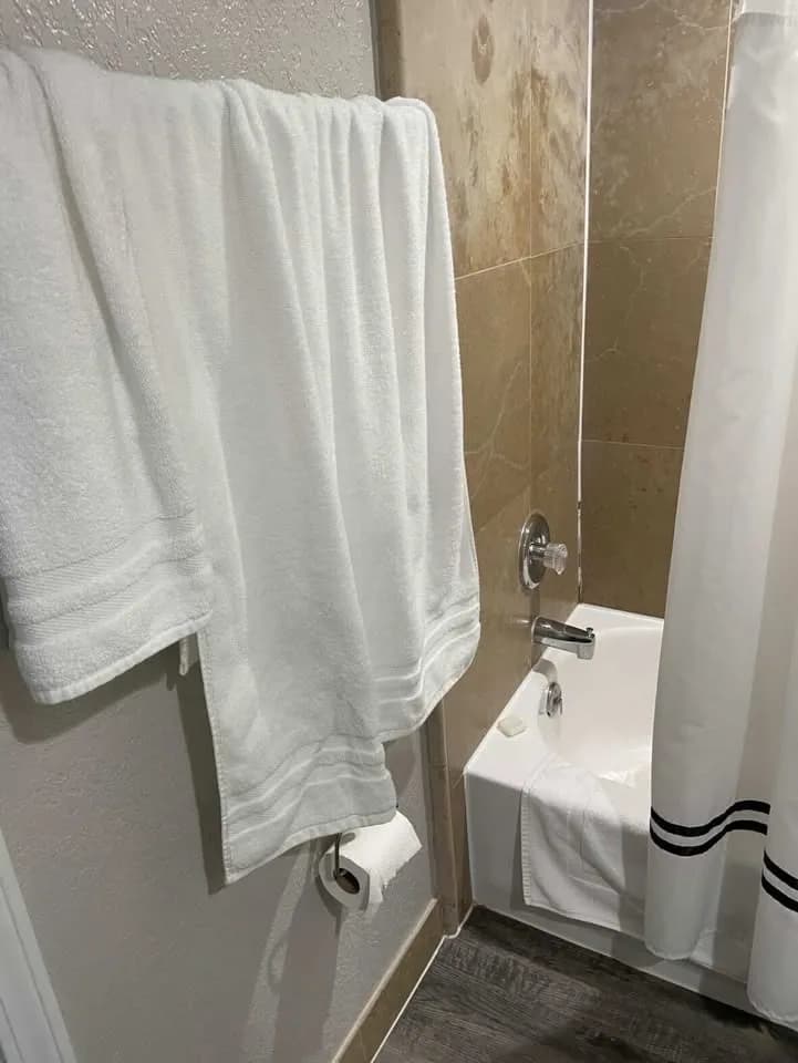 Freshly staged Airbnb bathroom with clean towels in Jacksonville FL